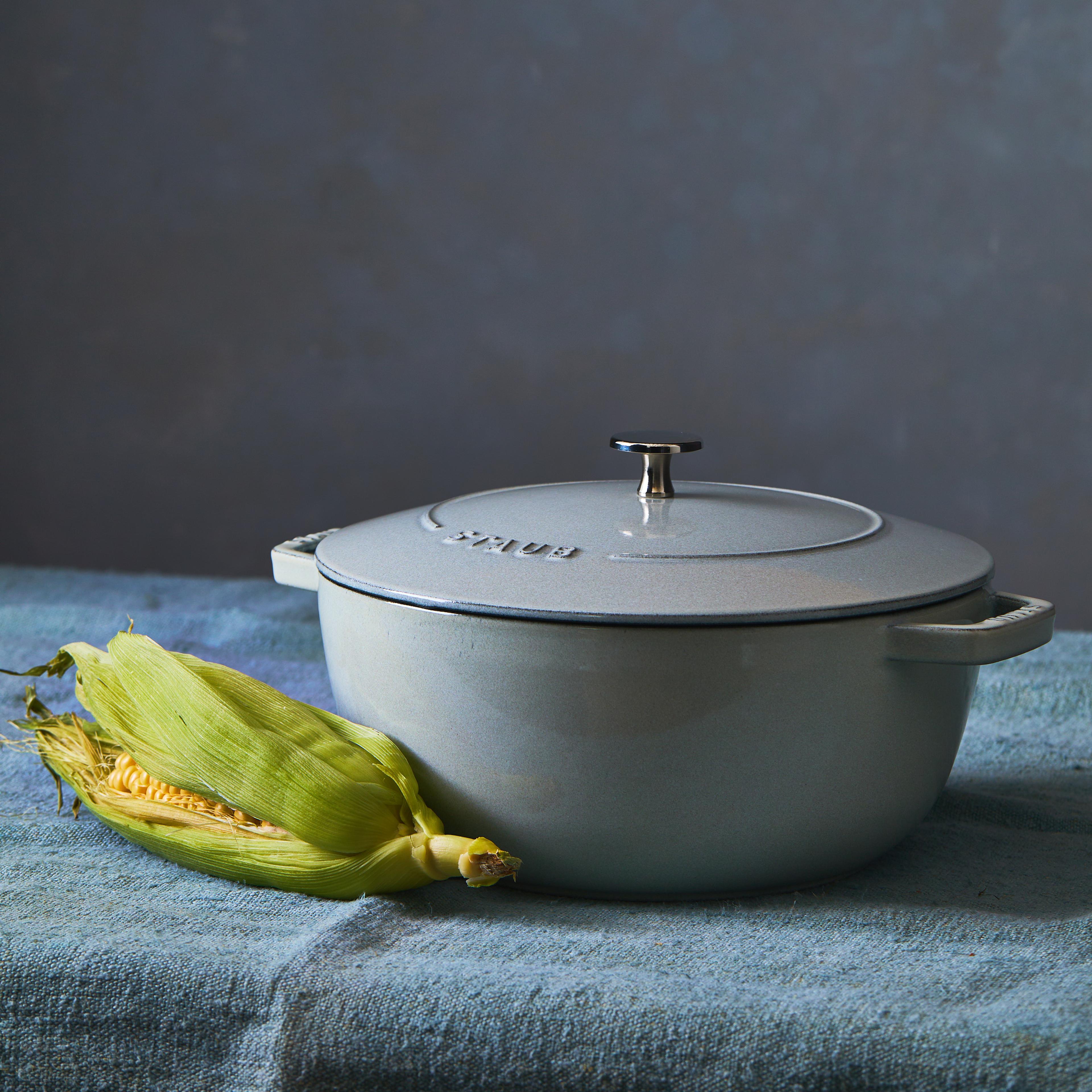 white dutch oven with corn