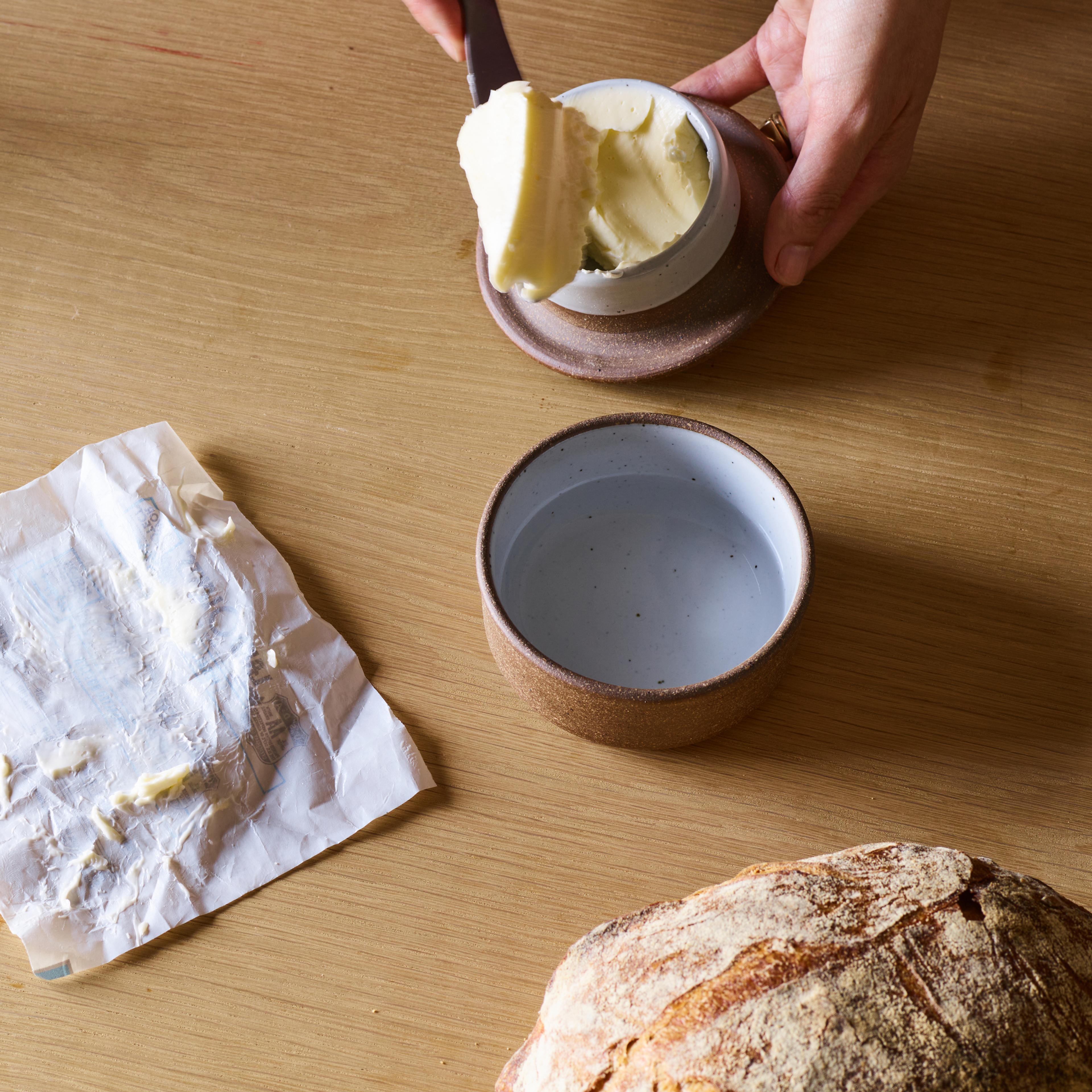 ceramic butter keeper being filled