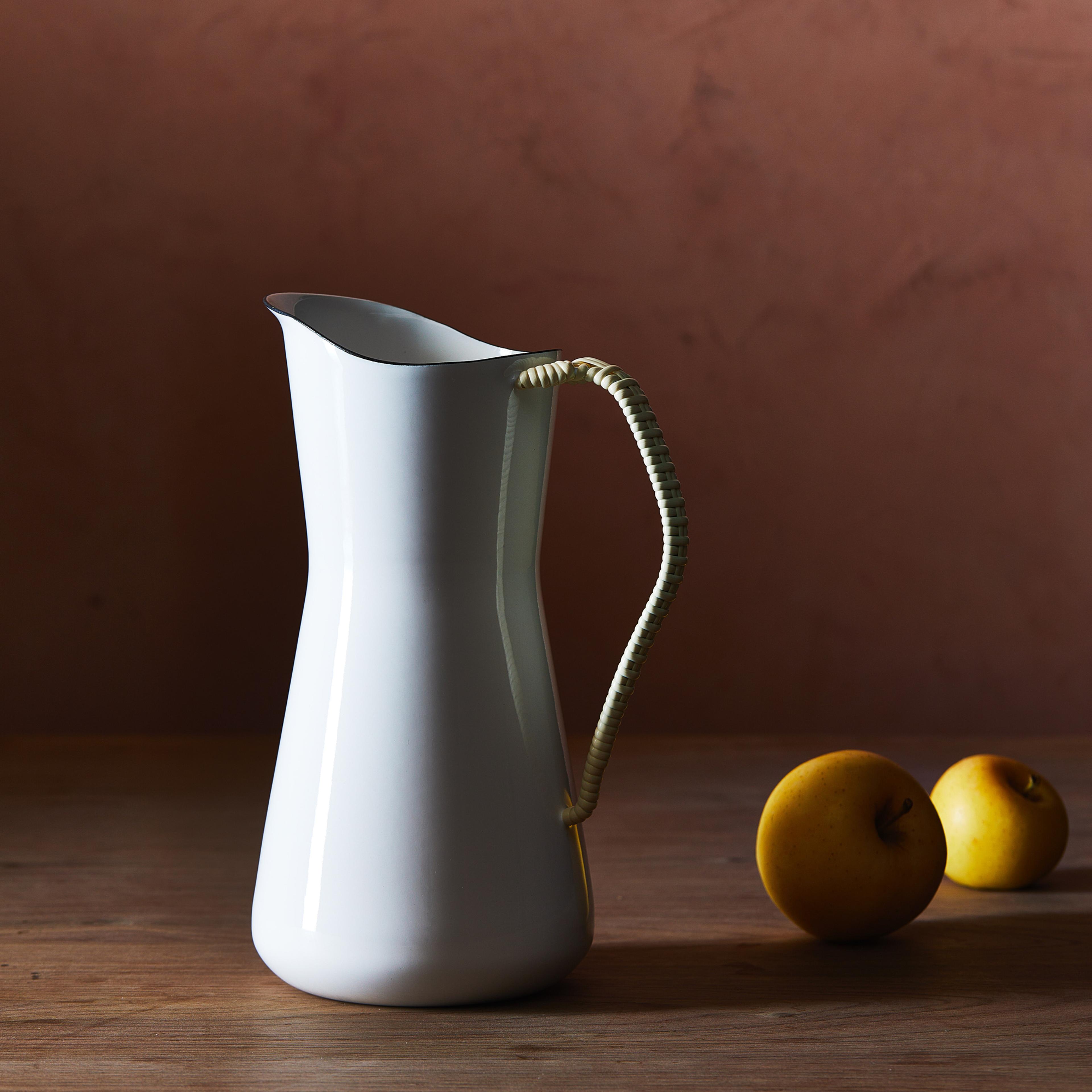 white dansk pitcher with lemons
